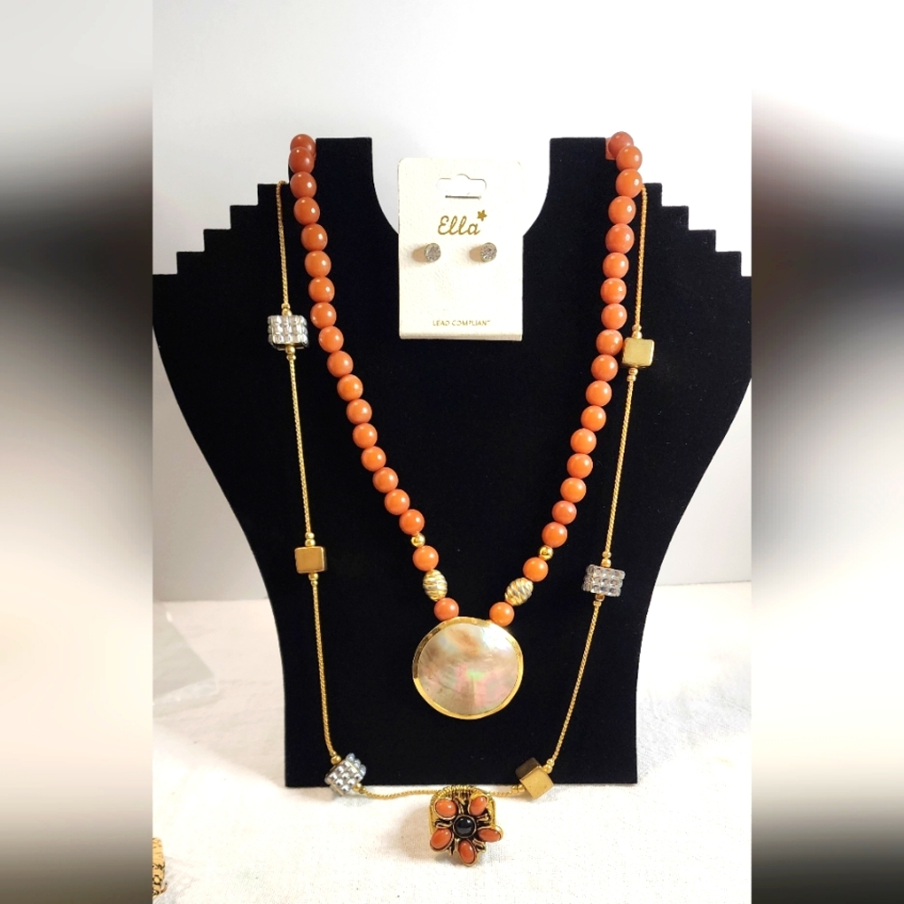 2 necklaces, ring, and earnings